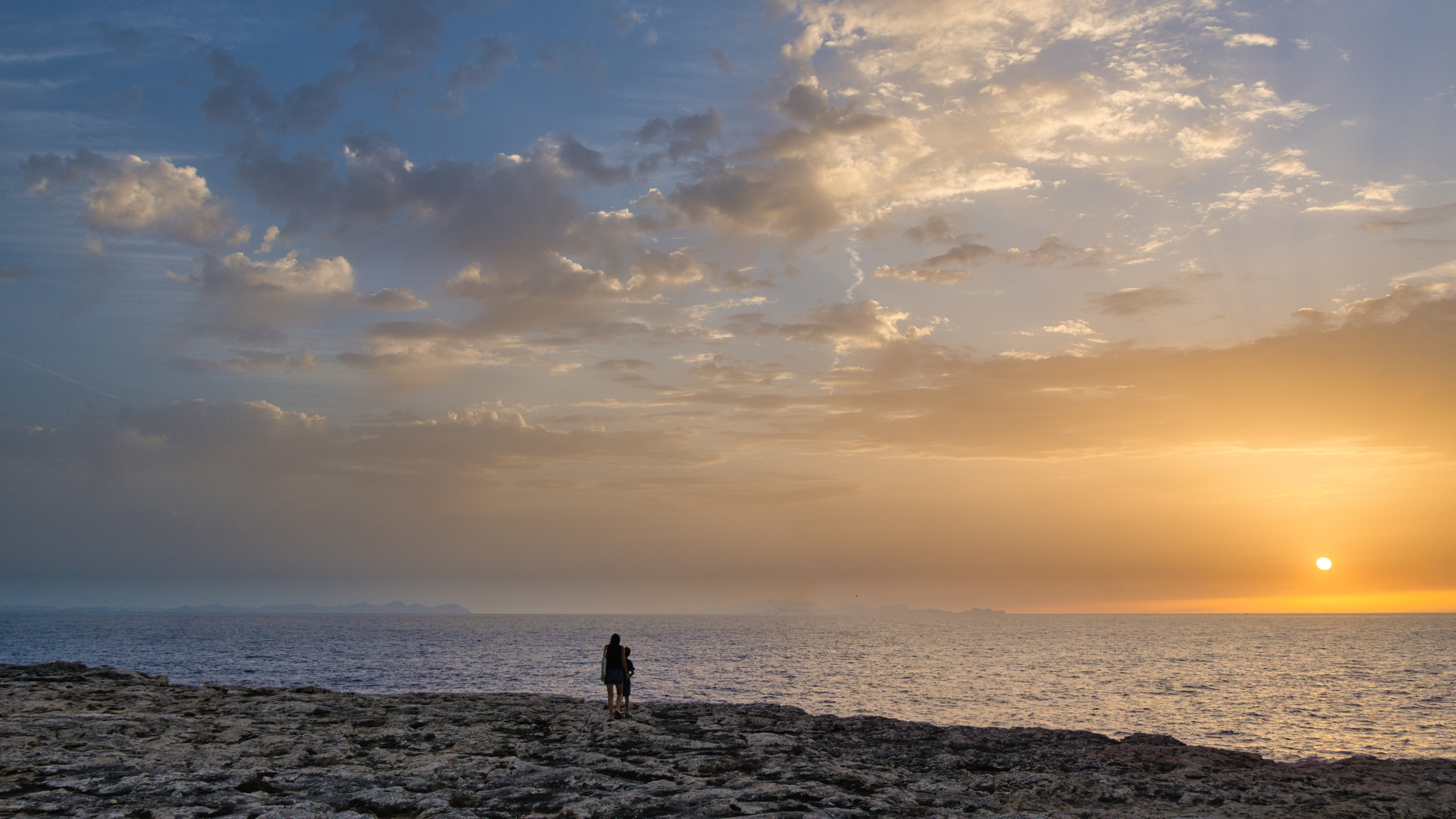 90% sure both pieces of land in the background are actually part of Mallorca, Menorca's big brother island to the west