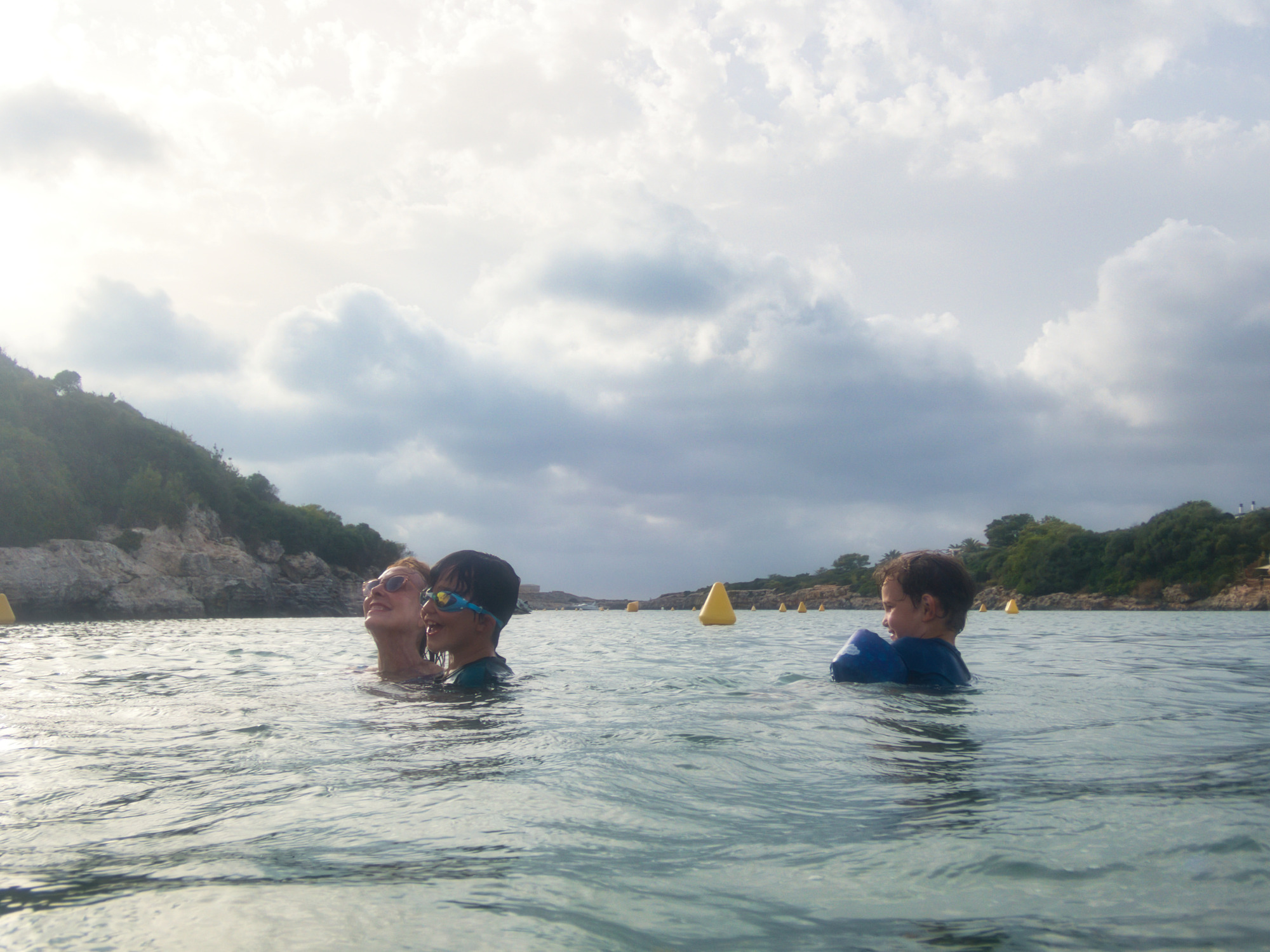 Swimming with Mimi in Cala Santandria, the beach 10 minutes from our Air BnB